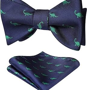 Conjunto de pañuelo y pajarita azul con motivos verdes de dinosaurios